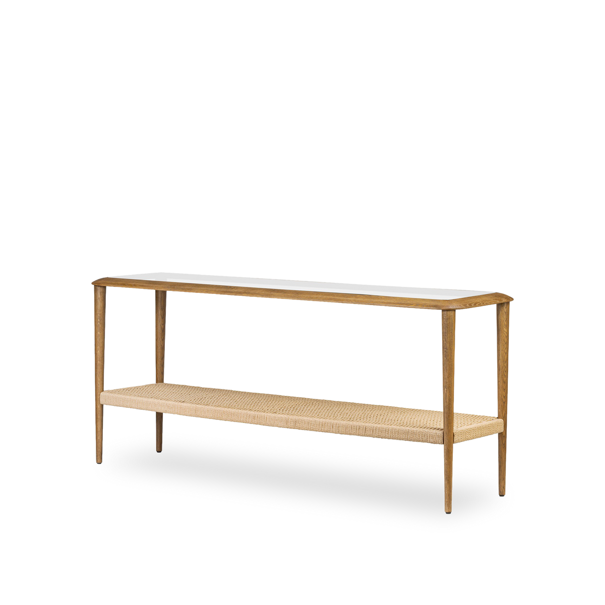 Angled view of the Uma Console Table showing tapered oak legs, glass top and woven lower shelf.