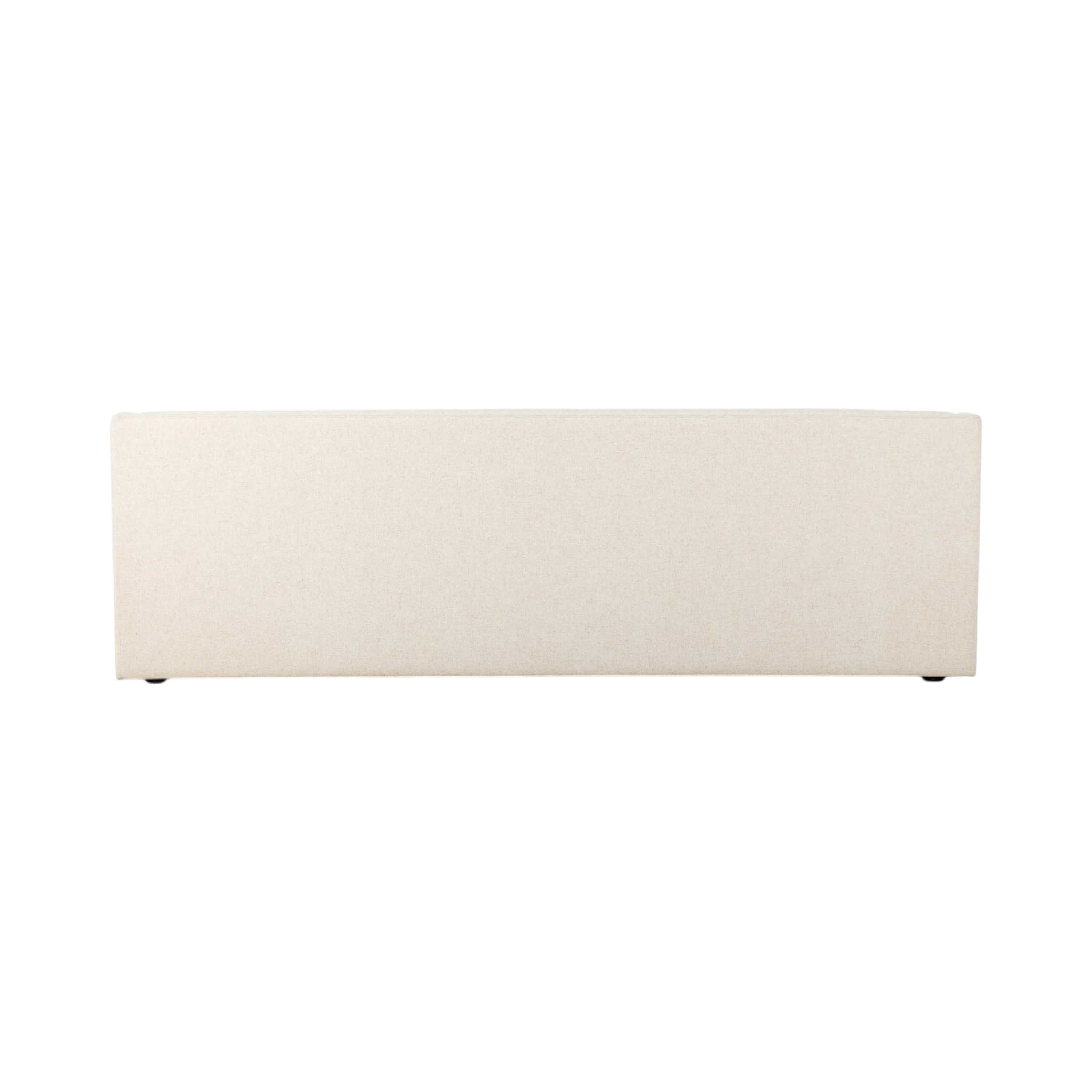 Rear view of the Giselle Sofa in natural oatmeal upholstery, showing its clean, fully upholstered back and understated rectangular silhouette.
