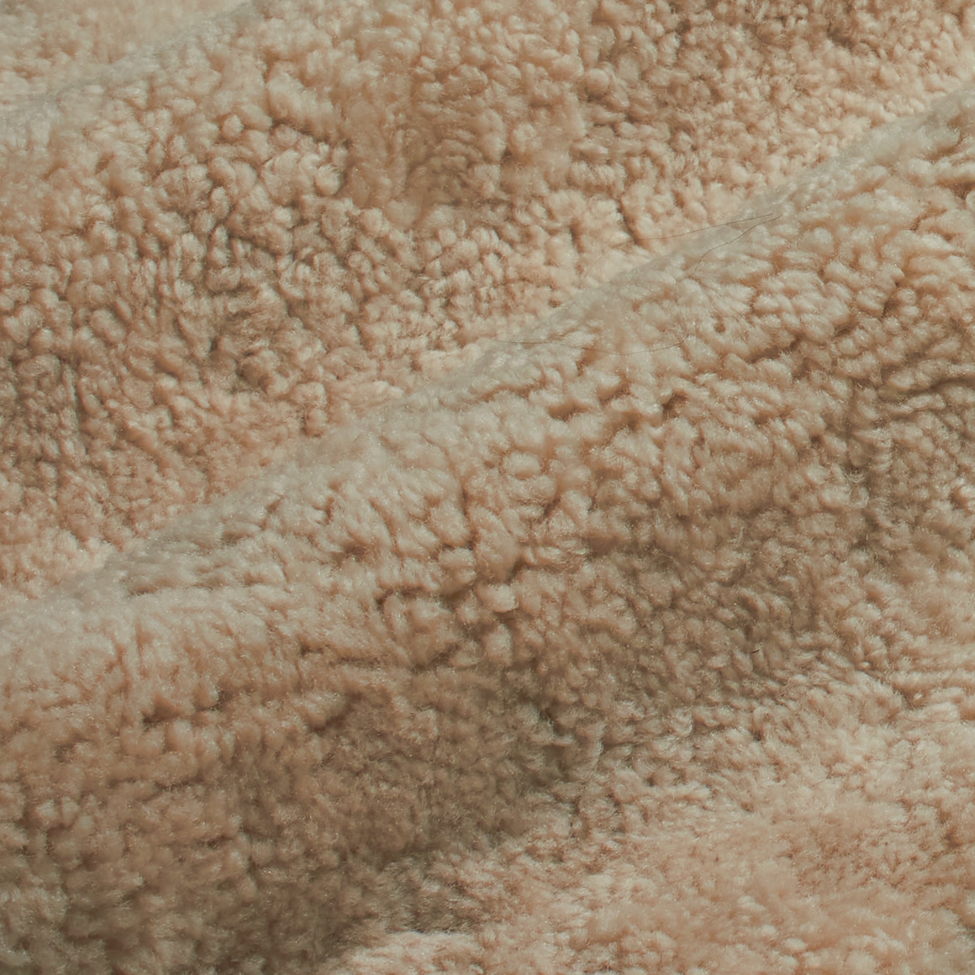 With exceptionally soft and high-quality natural materials, the quality is easy to feel in the Sheepskin Rug's beautiful curls.