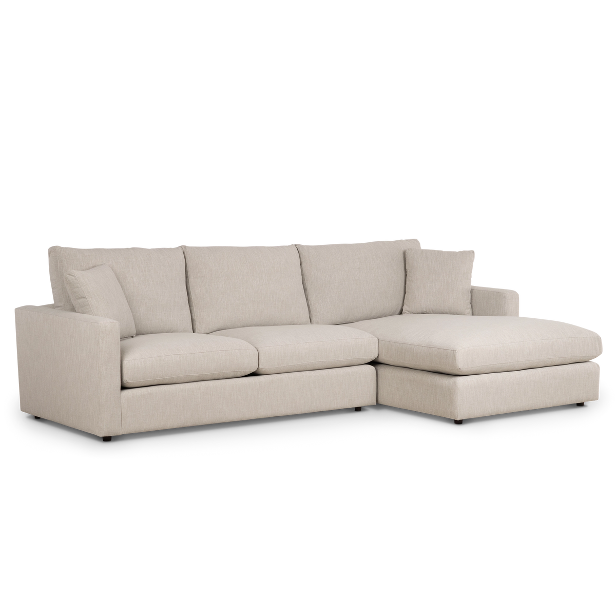 Beacon Chaise Sectional in soft neutral upholstery with oversized back cushions, broad track arms and a right-facing chaise.