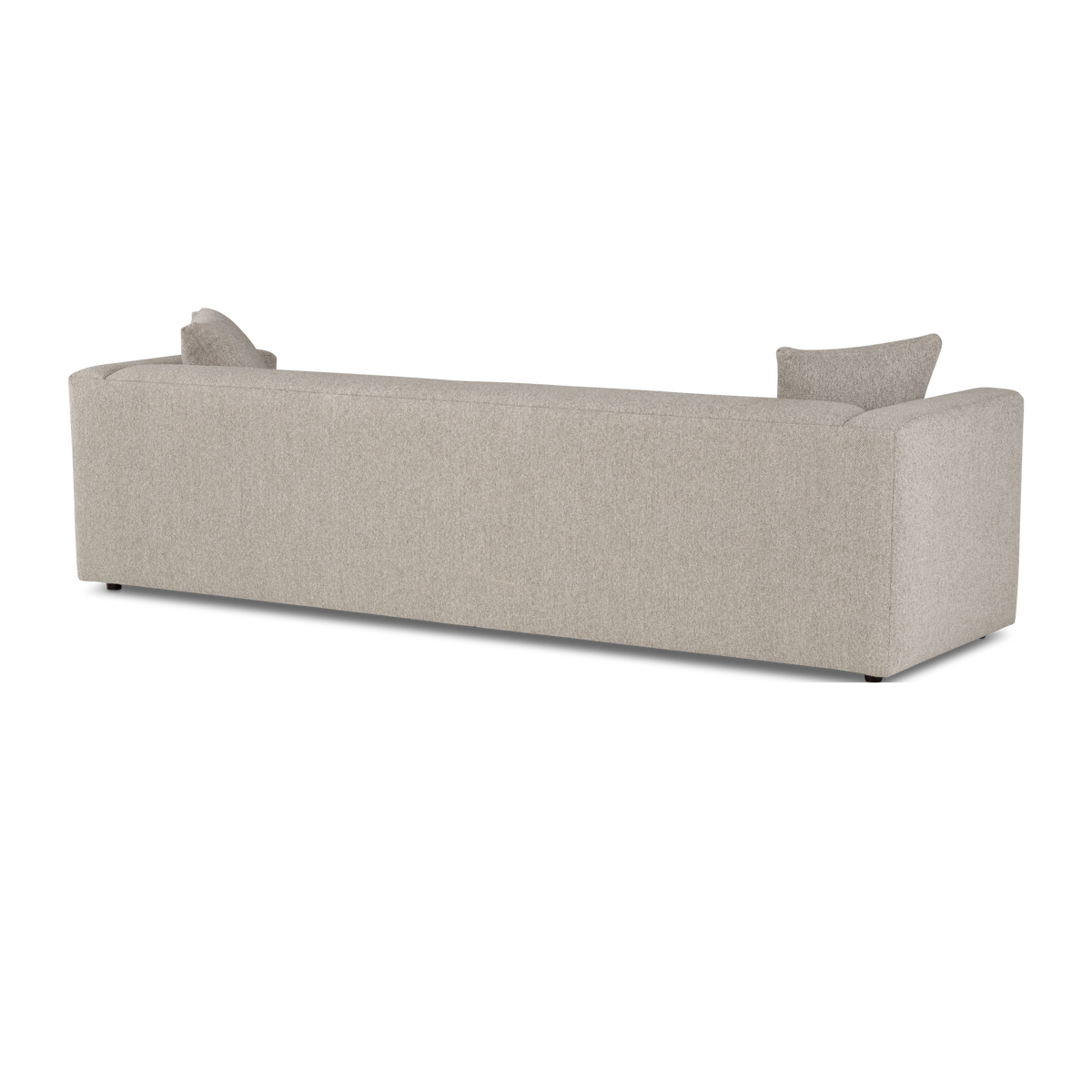 Angled rear view of the Ease Sofa in Pebble textured fabric, showing the smooth, fully upholstered back, the squared arms, and the dark feet.