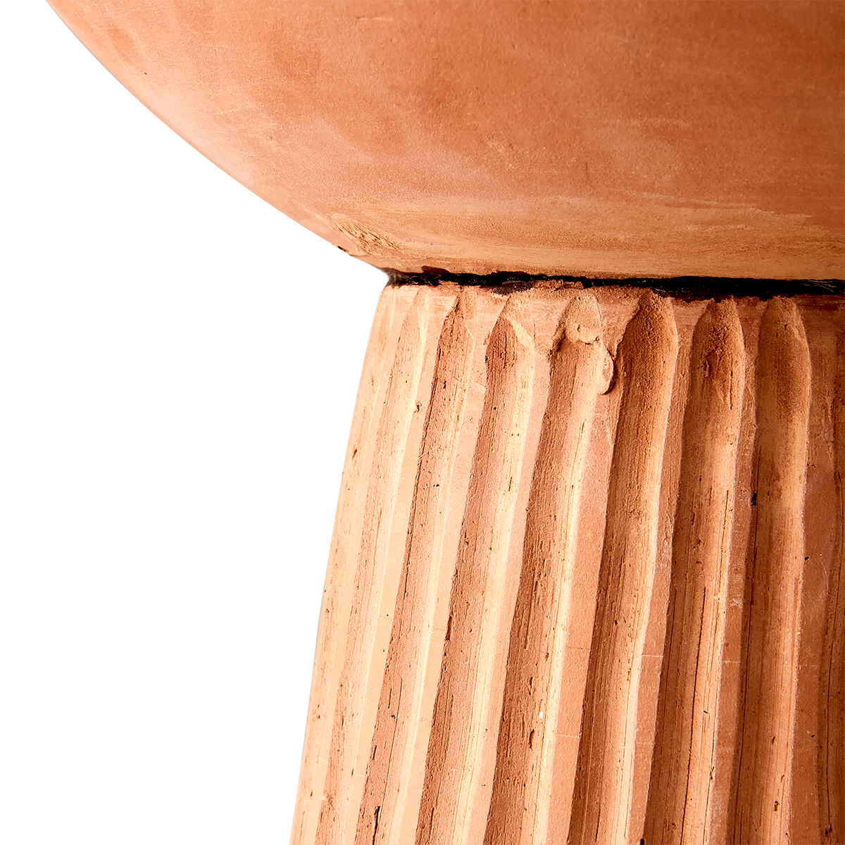 Inspired by Greek Doric-style columns, the Footed Clay Bowl has a tall channeled foot that hoists up a softly curved bowl.