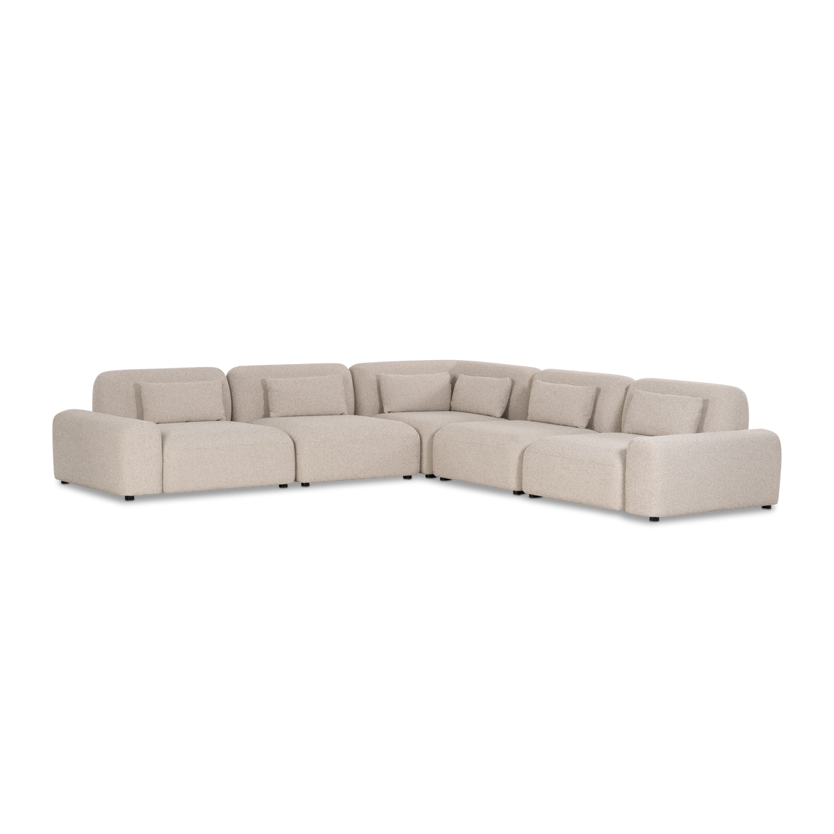 Angled view of the Duncan Modular Sectional in Oatmeal flecked woven fabric, showing five connected sections, the corner turn and rounded arms at each end.