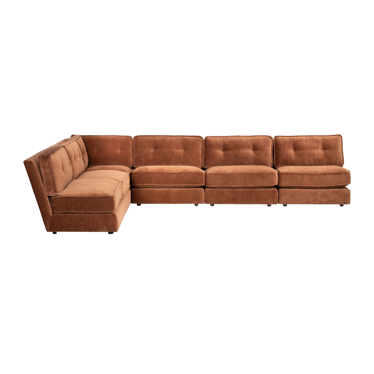 Loom Modular Sectional shown from the front in sienna chenille, with the corner bend on the left, three tufted back cushions along the long run, and the deep piped seat cushions.