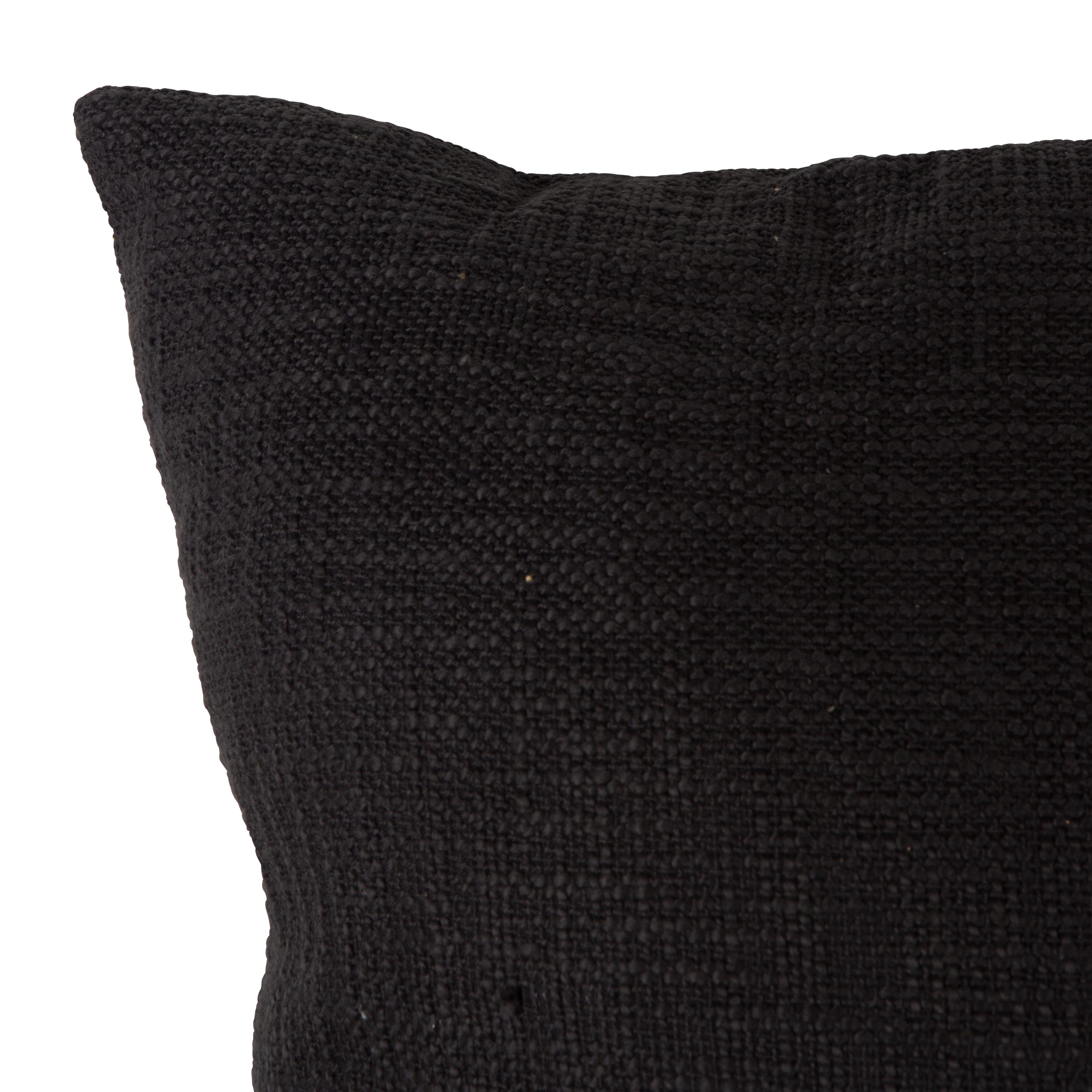 The Cotton Weave Pillow features a simple design in a solid black colour.