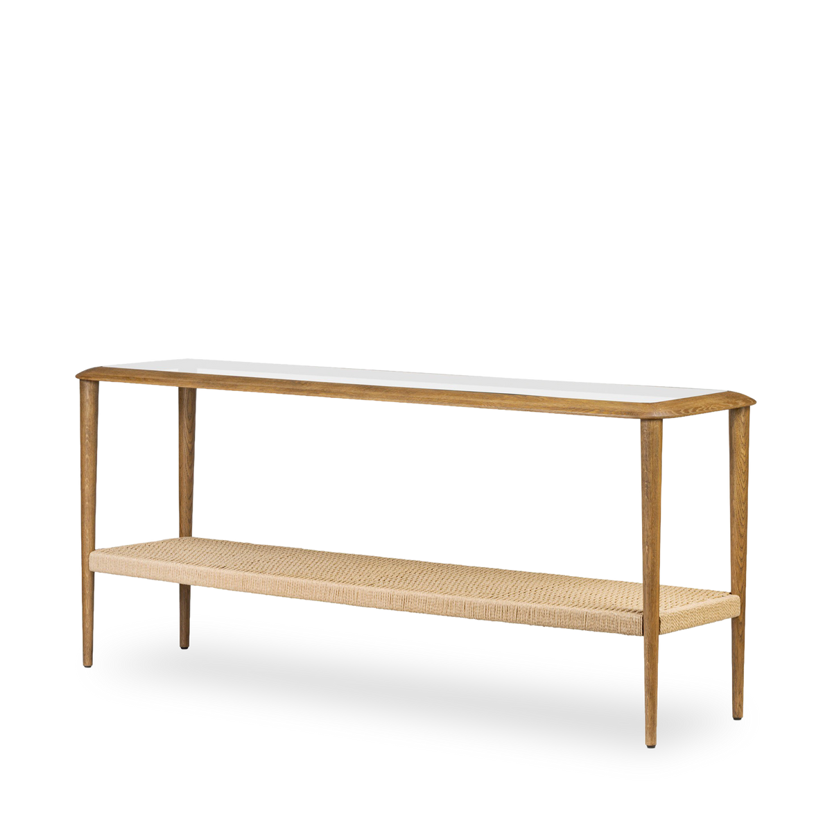 Angled view of the Uma Console Table showing tapered oak legs, glass top and woven lower shelf.