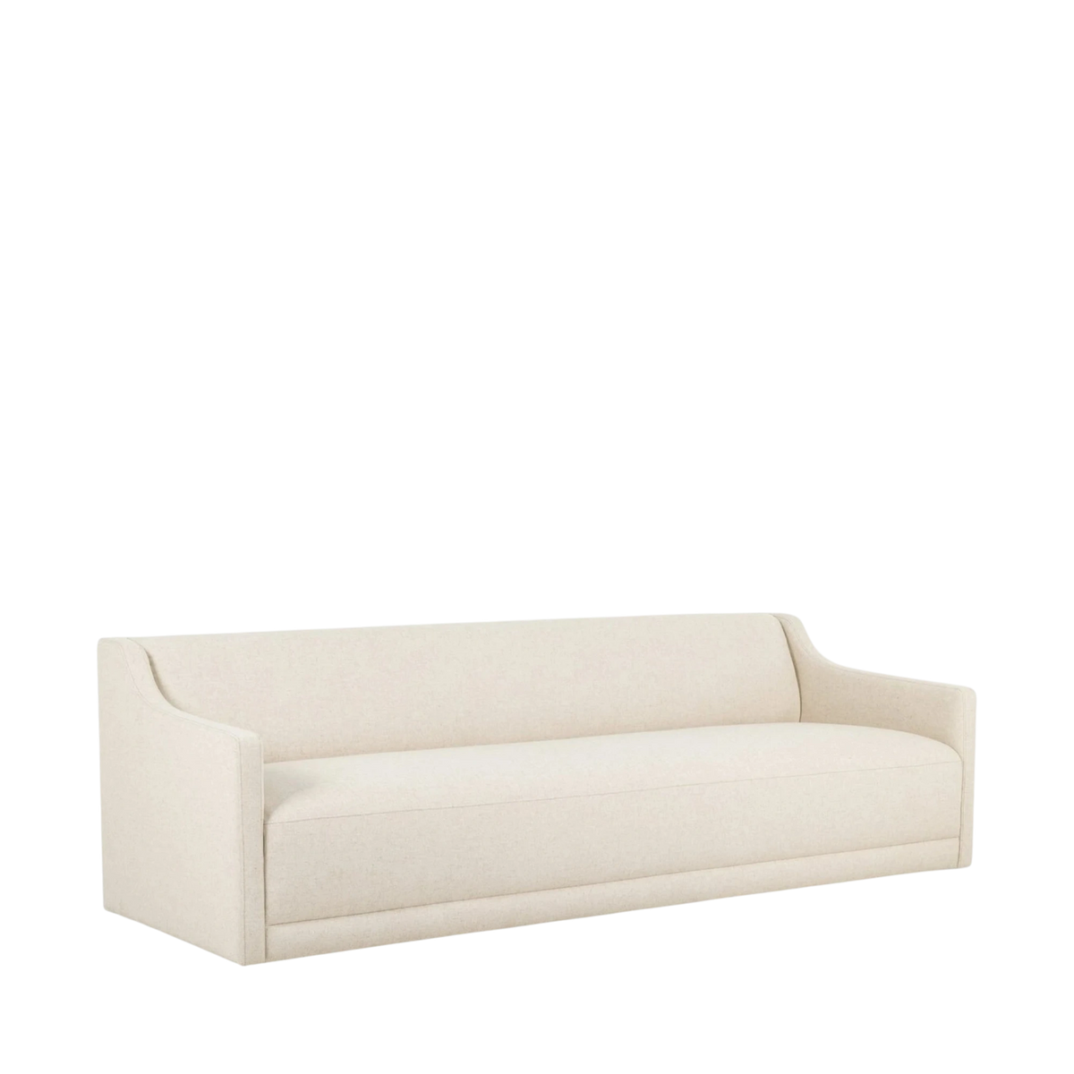 Angled view of the Giselle Sofa in Antwerp Natural fabric, showing its gently curved back, sloped arms and streamlined upholstered base.