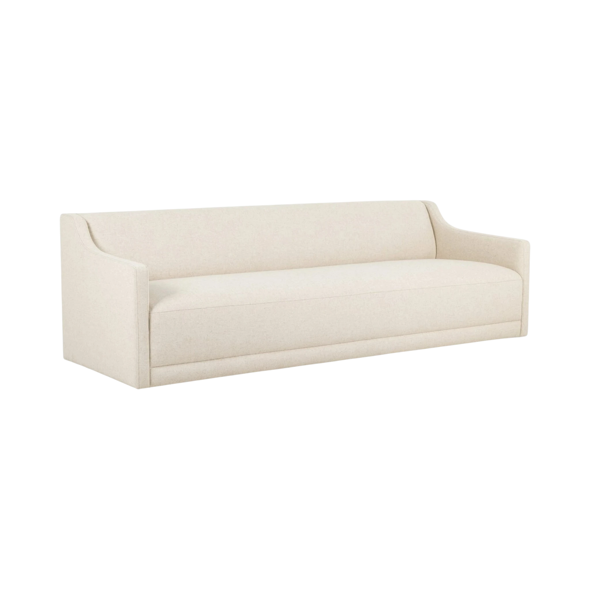 Angled view of the Giselle Sofa in Antwerp Natural fabric, showing its gently curved back, sloped arms and streamlined upholstered base.