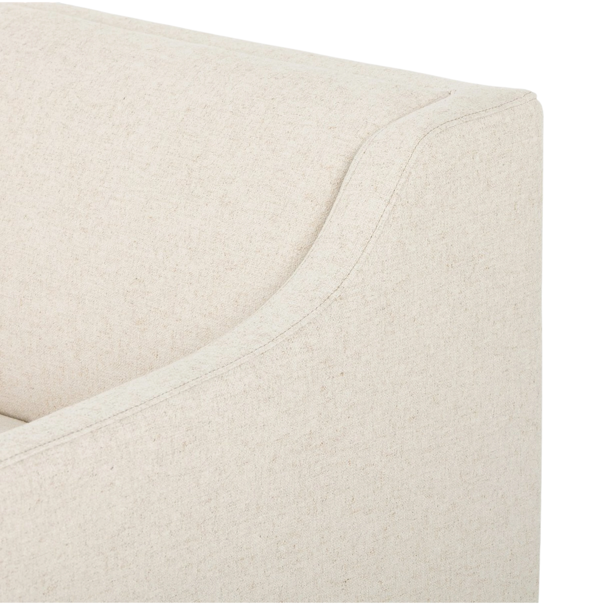 Close-up of the Giselle Sofa showing the softly curved arm and backrest with tailored seam detailing in Antwerp Natural performance fabric.