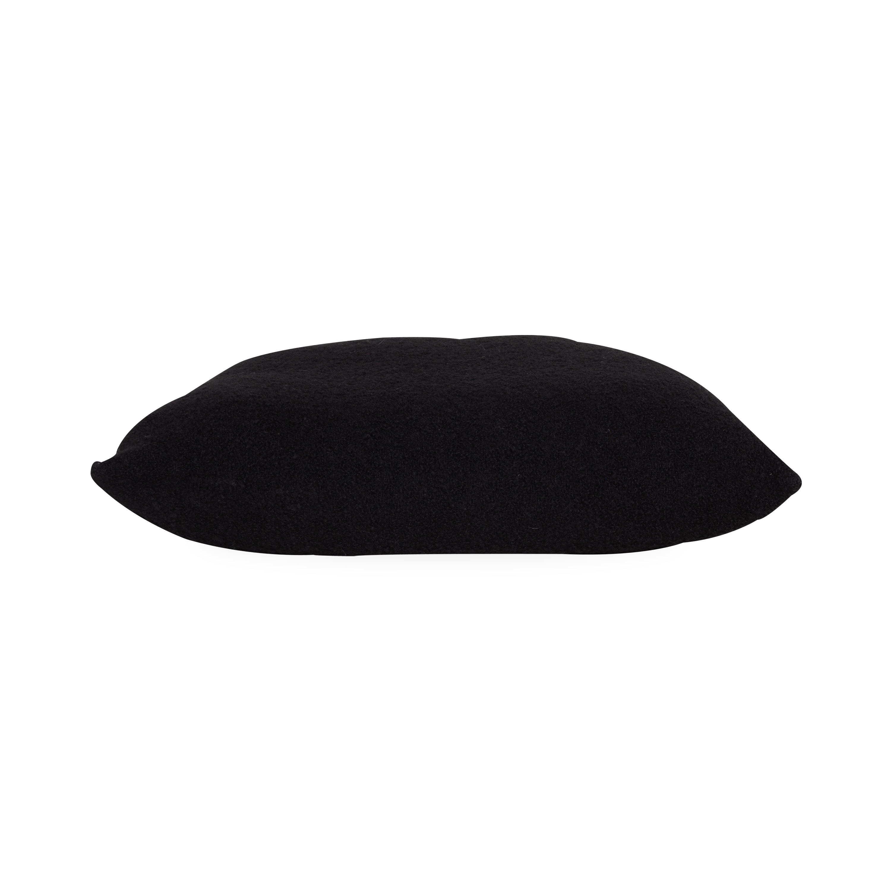Woven exclusively with wool from New Zealand, which is known for its superior quality and beautiful luster, the Wool Boucle Pillow provides a layer of textural appeal with its bouc