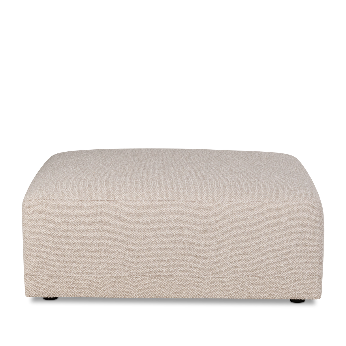 Arlo Modular Ottoman shown from the front in Oatmeal flecked woven fabric, highlighting the wide cushioned top, clean piped seams and short black feet.