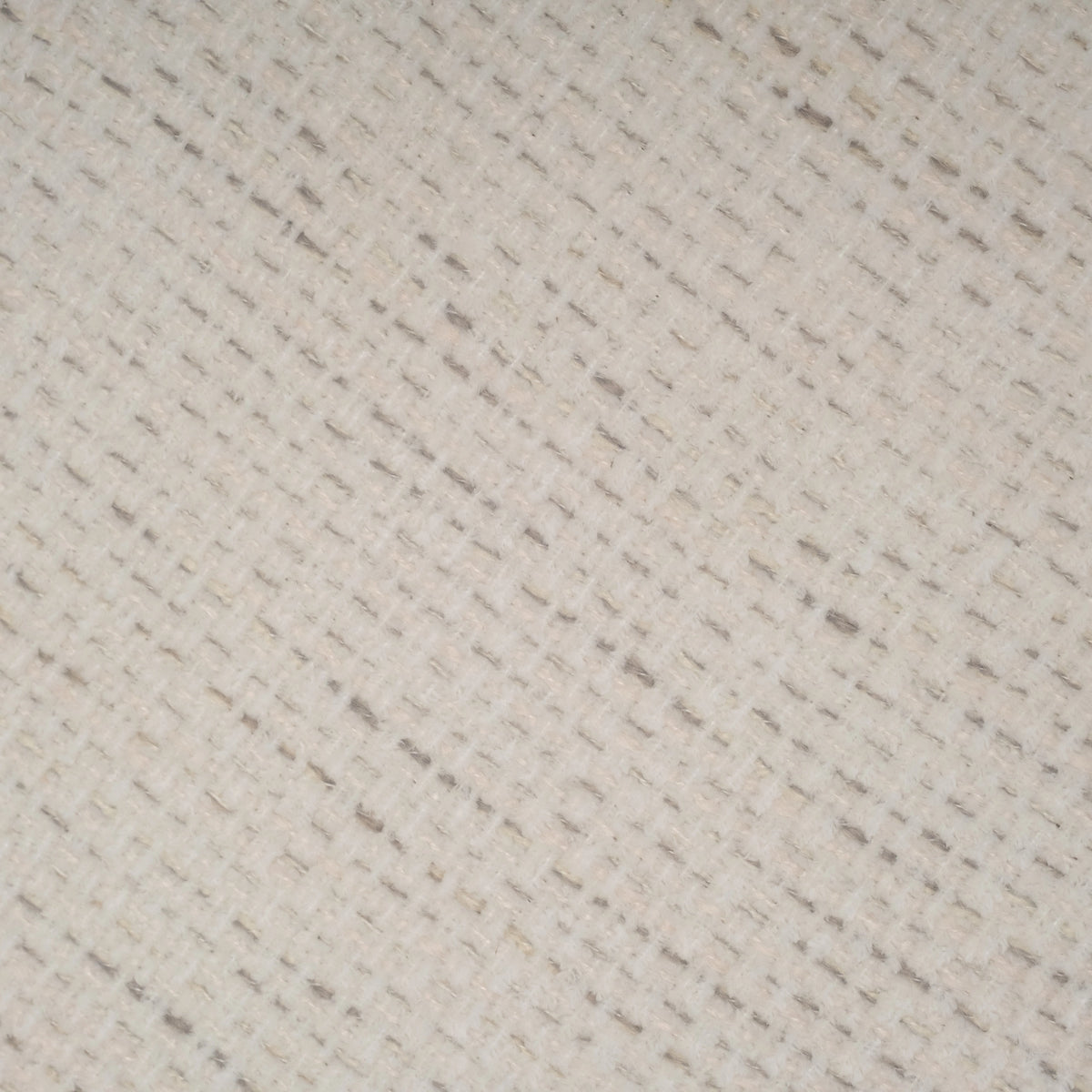 Close-up showing the Natural woven fabric used on the Rowe Swivel Chair, with a chunky, diagonal weave and soft gray flecks.