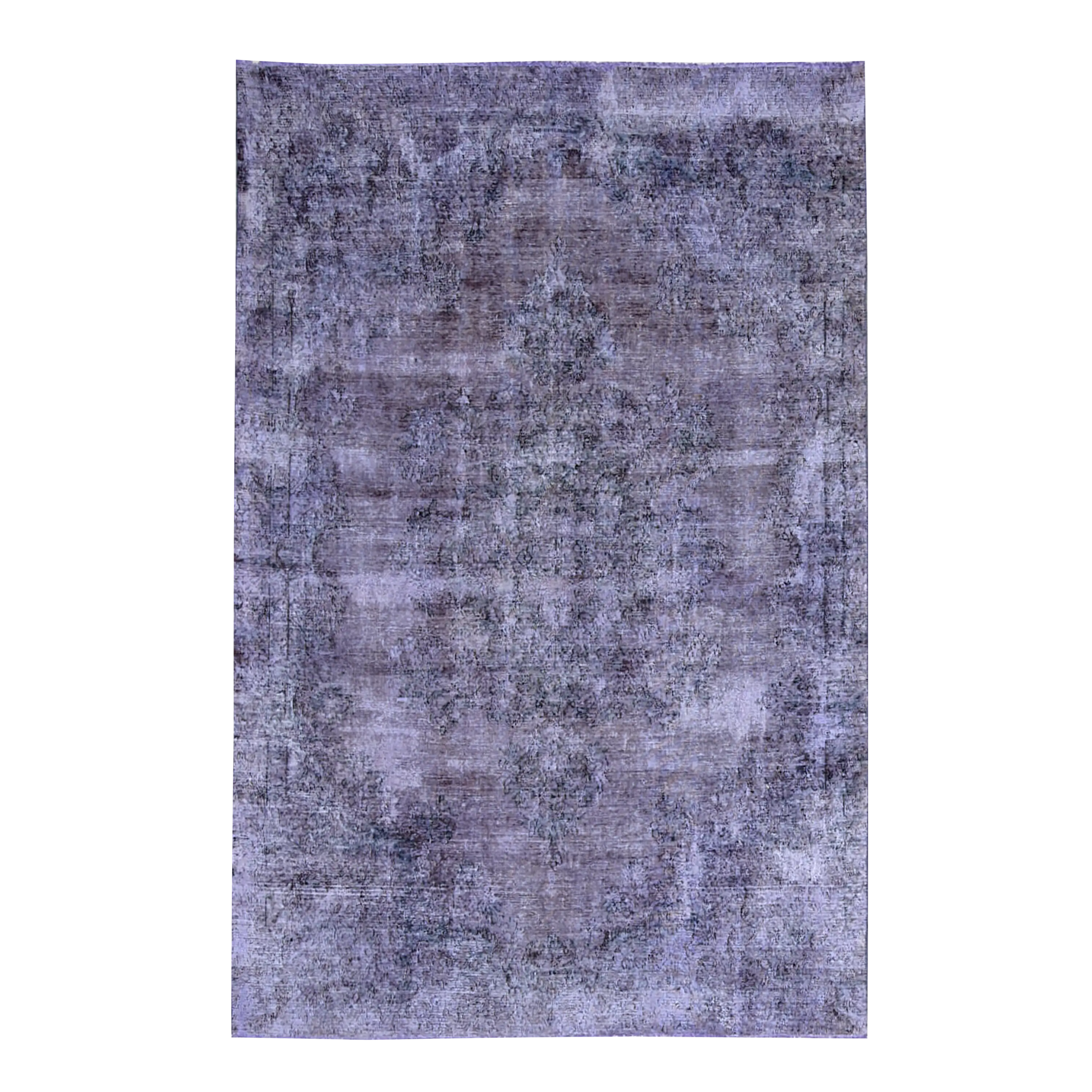 Antique Persian and Turkish rugs are stripped of their original colours, over-dyed and reborn, making each a one-of-a-kind piece.