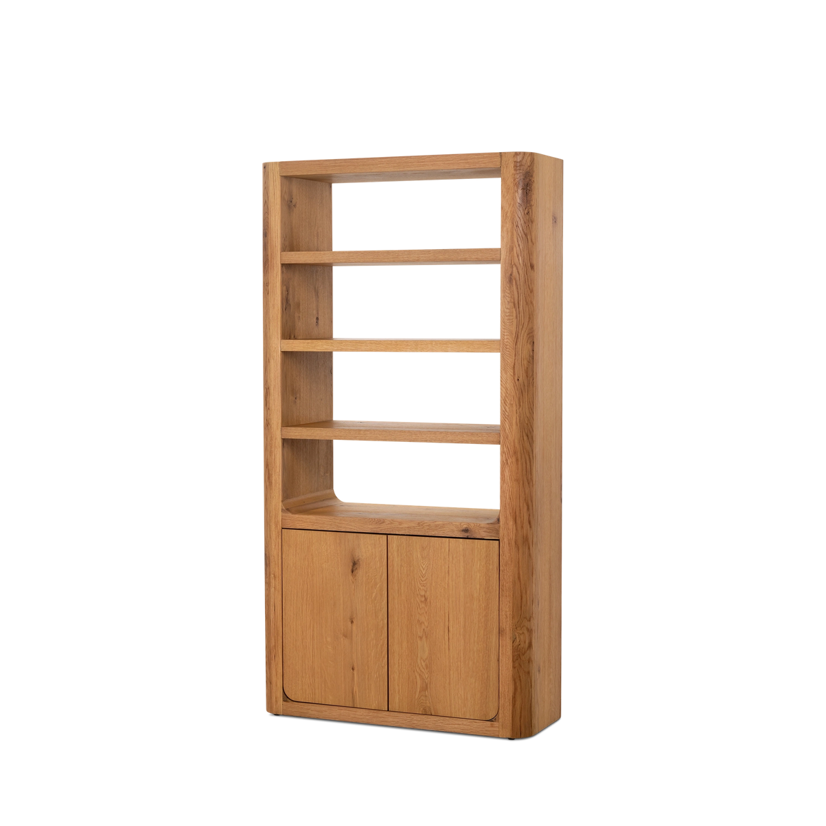 Edge Cabinet shown from an angle in honey oak with the lower doors closed, highlighting the rounded corners, the open shelves and the grain across the doors.