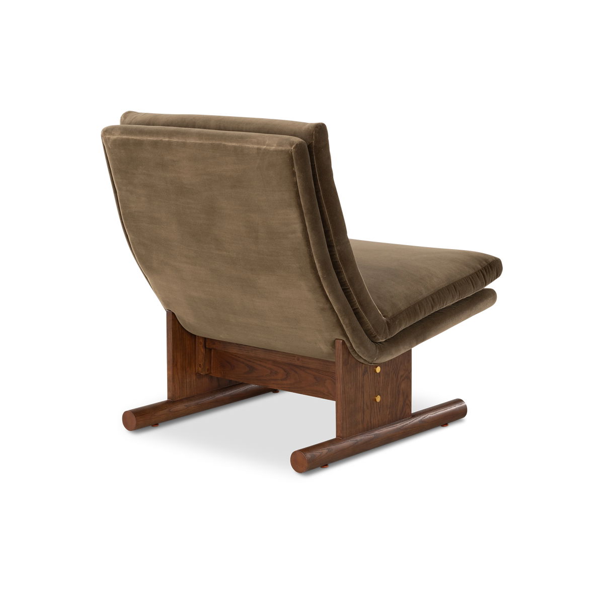 Wallace Lounge Chair in an angled rear view in Olive Brown velvet, highlighting the smooth curved back shell, the wood crossbar and the rounded ash runners.