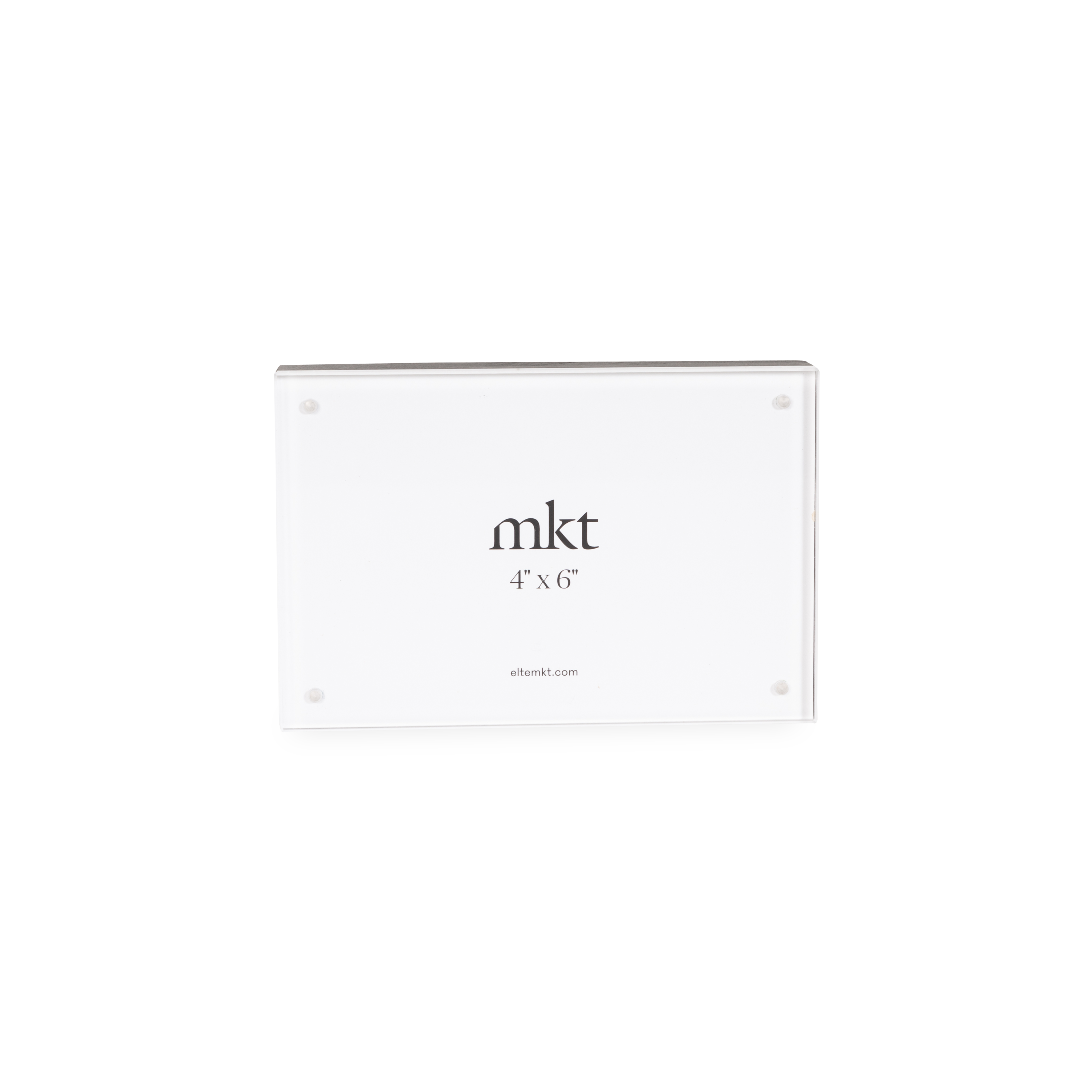 The Wood Magnetic Frame is a deep-set, tabletop picture frame that can hold either one photo or two back-to-back photos.