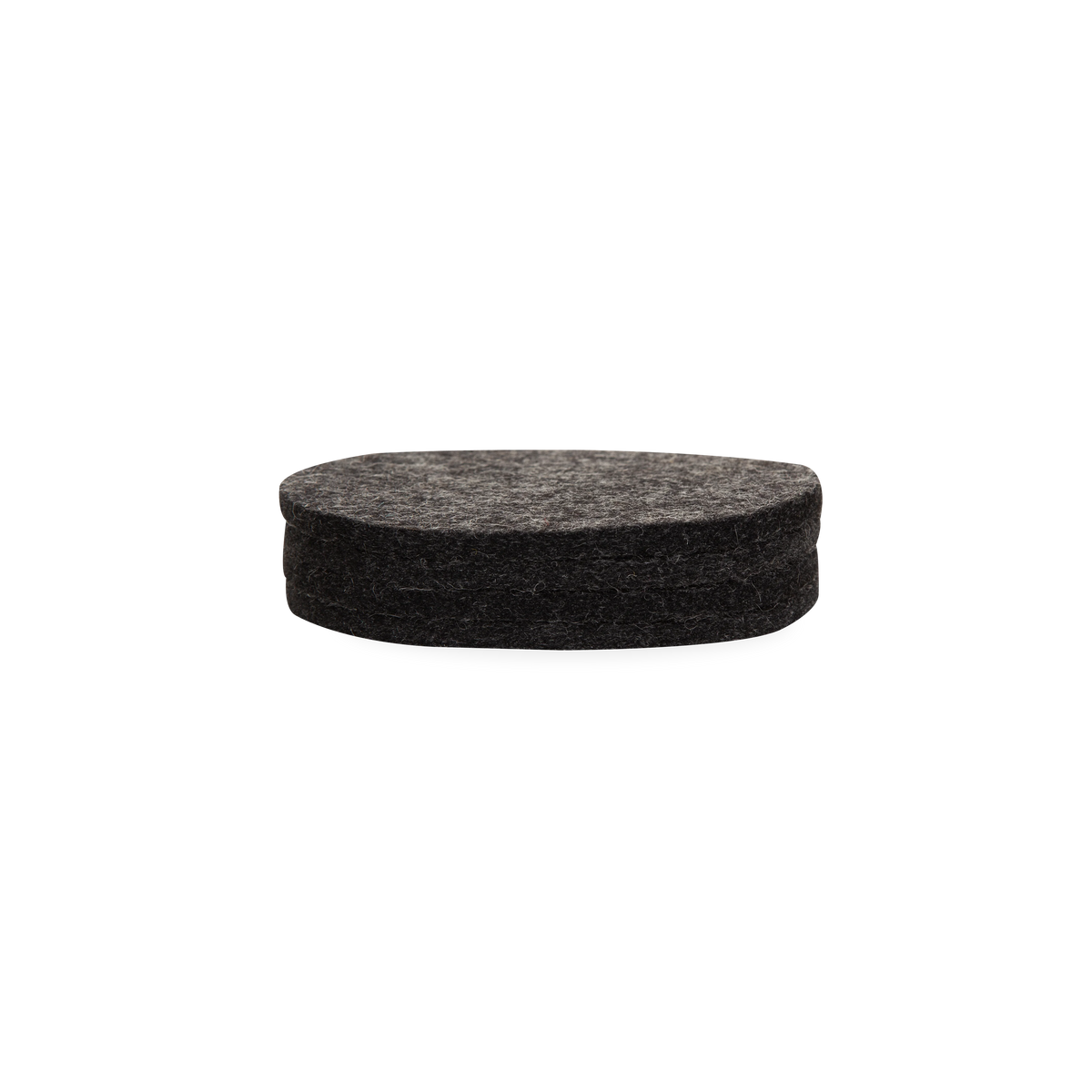 Made from the highest quality German merino wool, these Round Felt Coasters have a minimalist design that focuses on functional material.