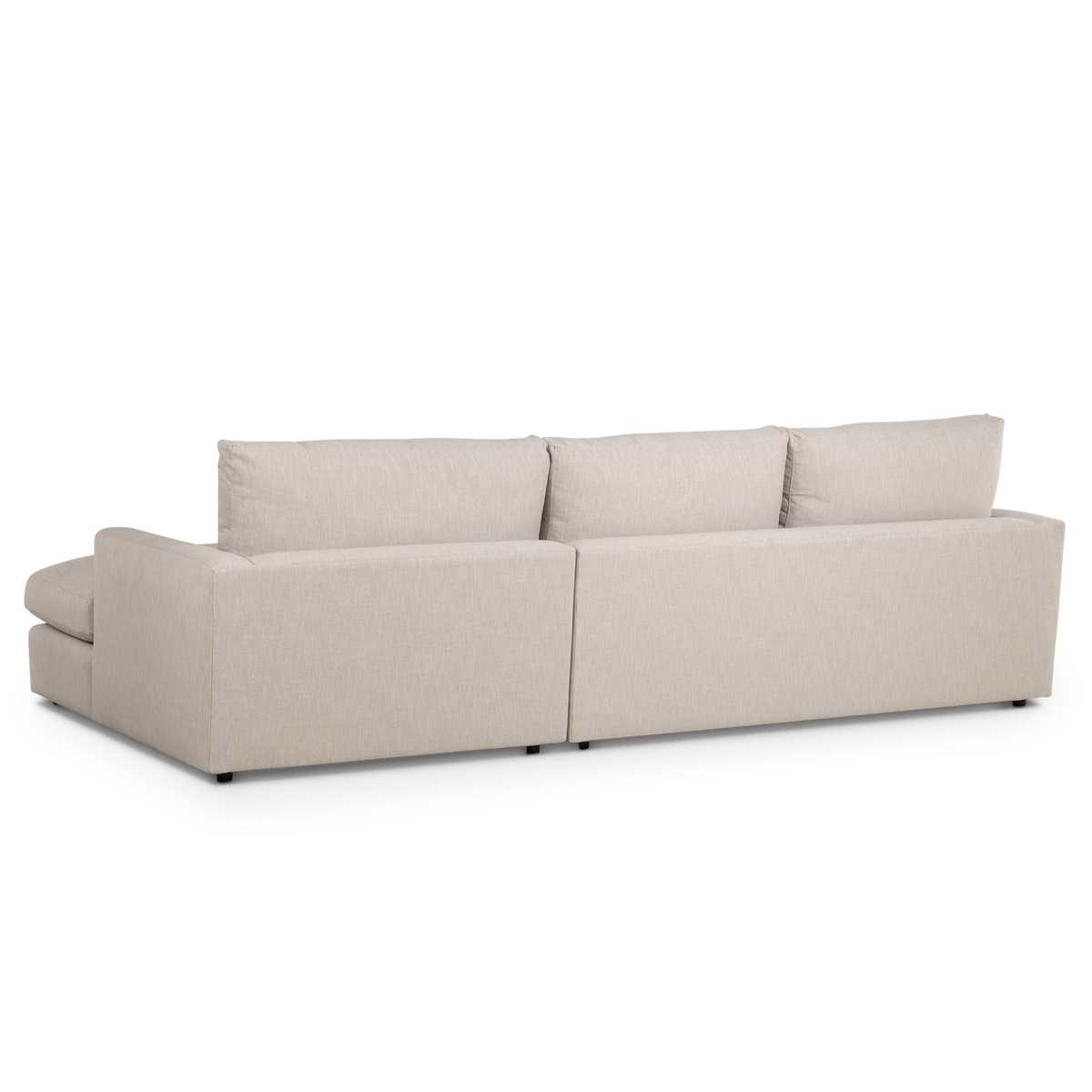 Close-up of the Beacon Chaise Sectional showing the softly textured neutral upholstery and tailored track arm.