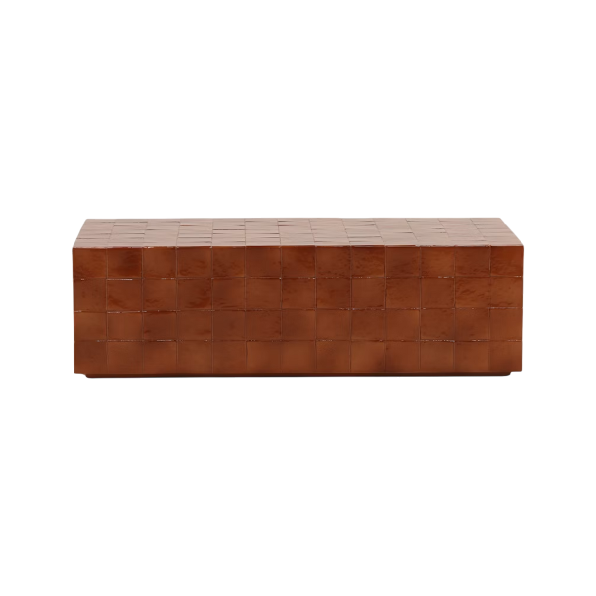 Front view of the Tilo Coffee Table, a low rectangular concrete table finished in a glossy Rust faux tile pattern with warm terracotta tones.