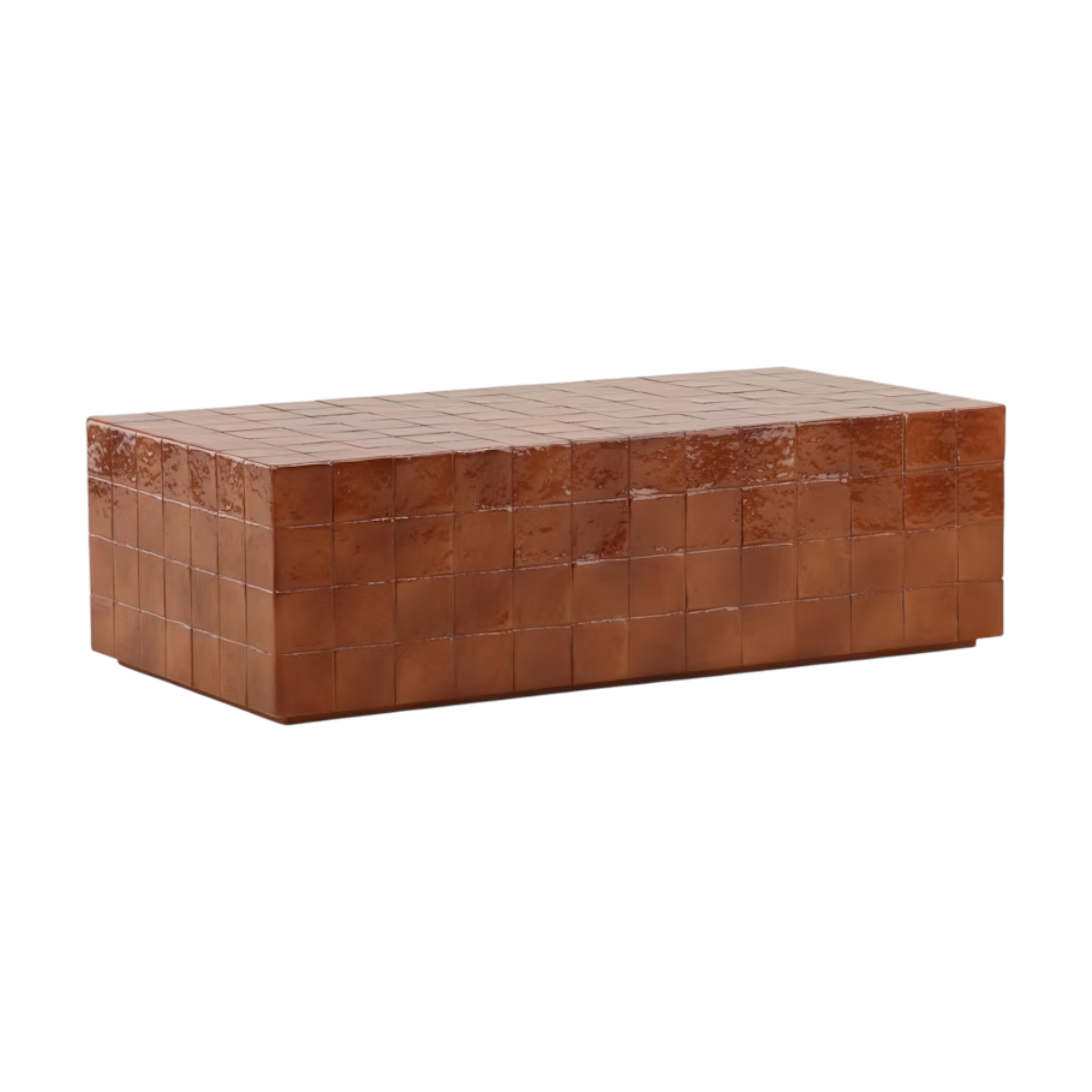Angled view of the Tilo Coffee Table showing its block-like silhouette, tiled grid pattern and mottled rust-coloured finish wrapping across the top and sides.