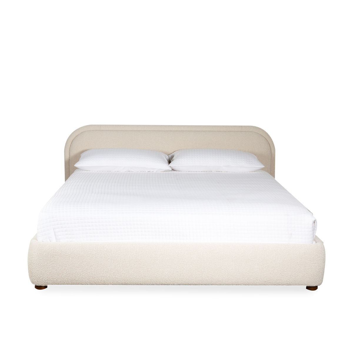 Embracing a gentle aesthetic, the Hollis Bed is a rich display of curving lines and soft edges.