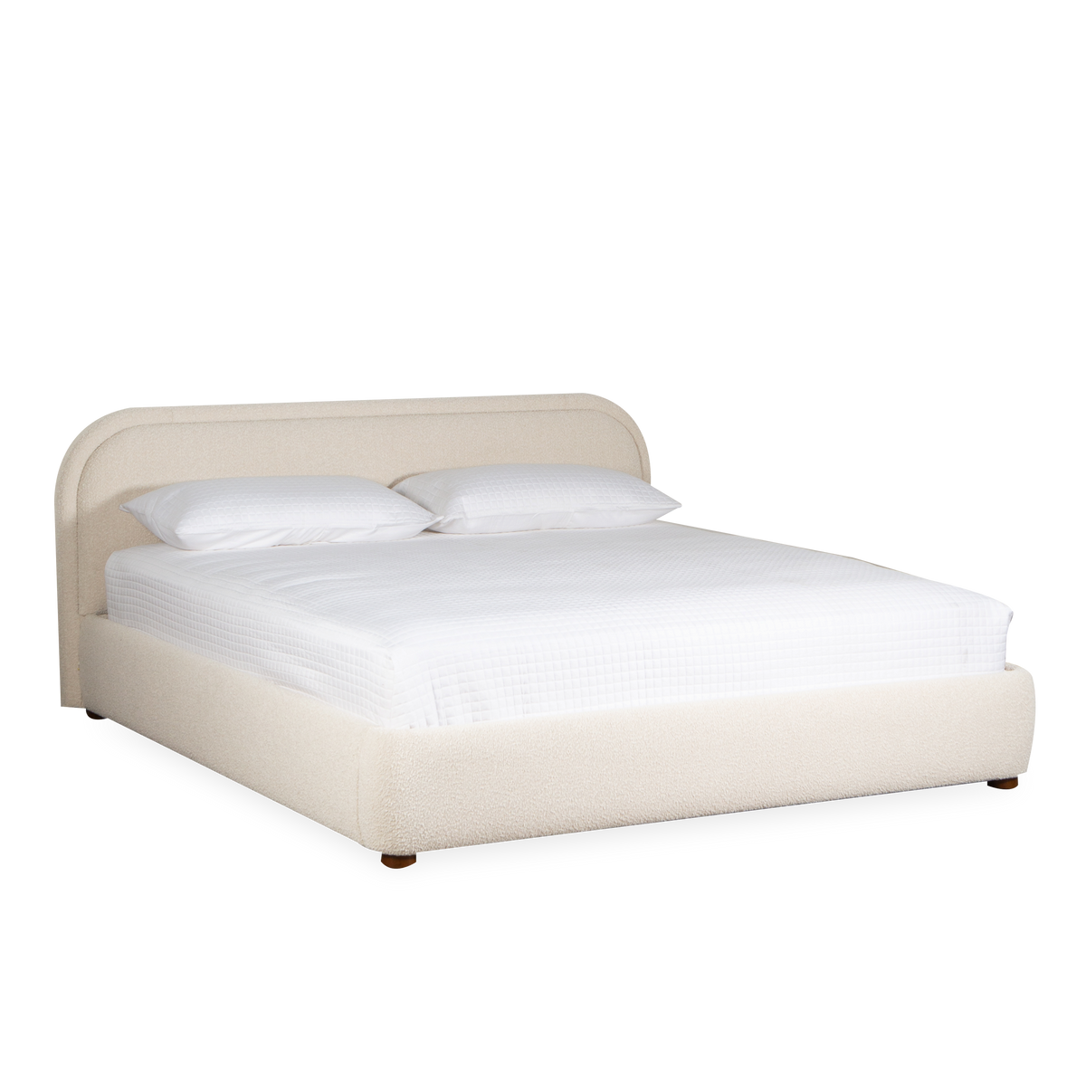 Embracing a gentle aesthetic, the Hollis Bed is a rich display of curving lines and soft edges.
