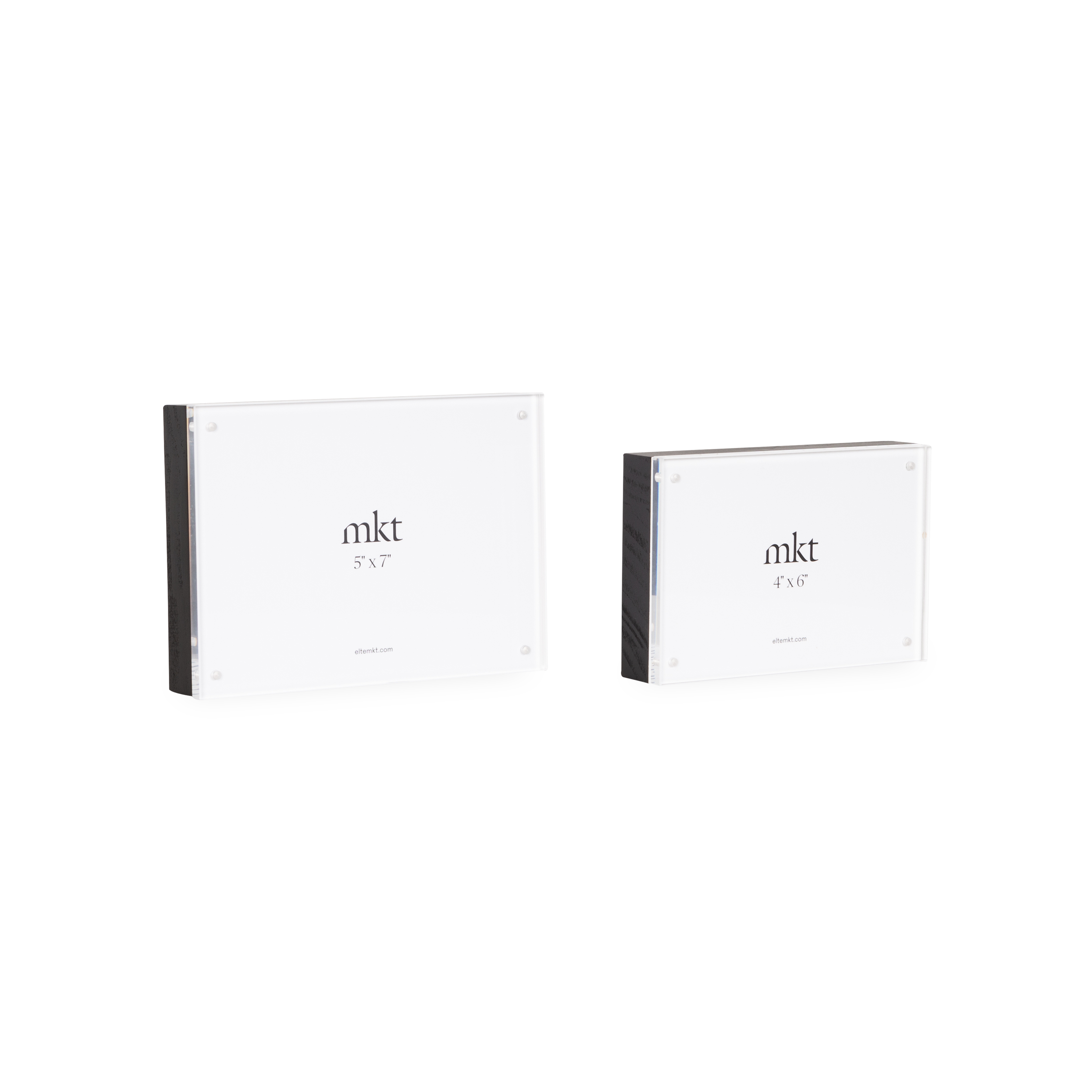 The Wood Magnetic Frame is a deep-set, tabletop picture frame that can hold either one photo or two back-to-back photos.