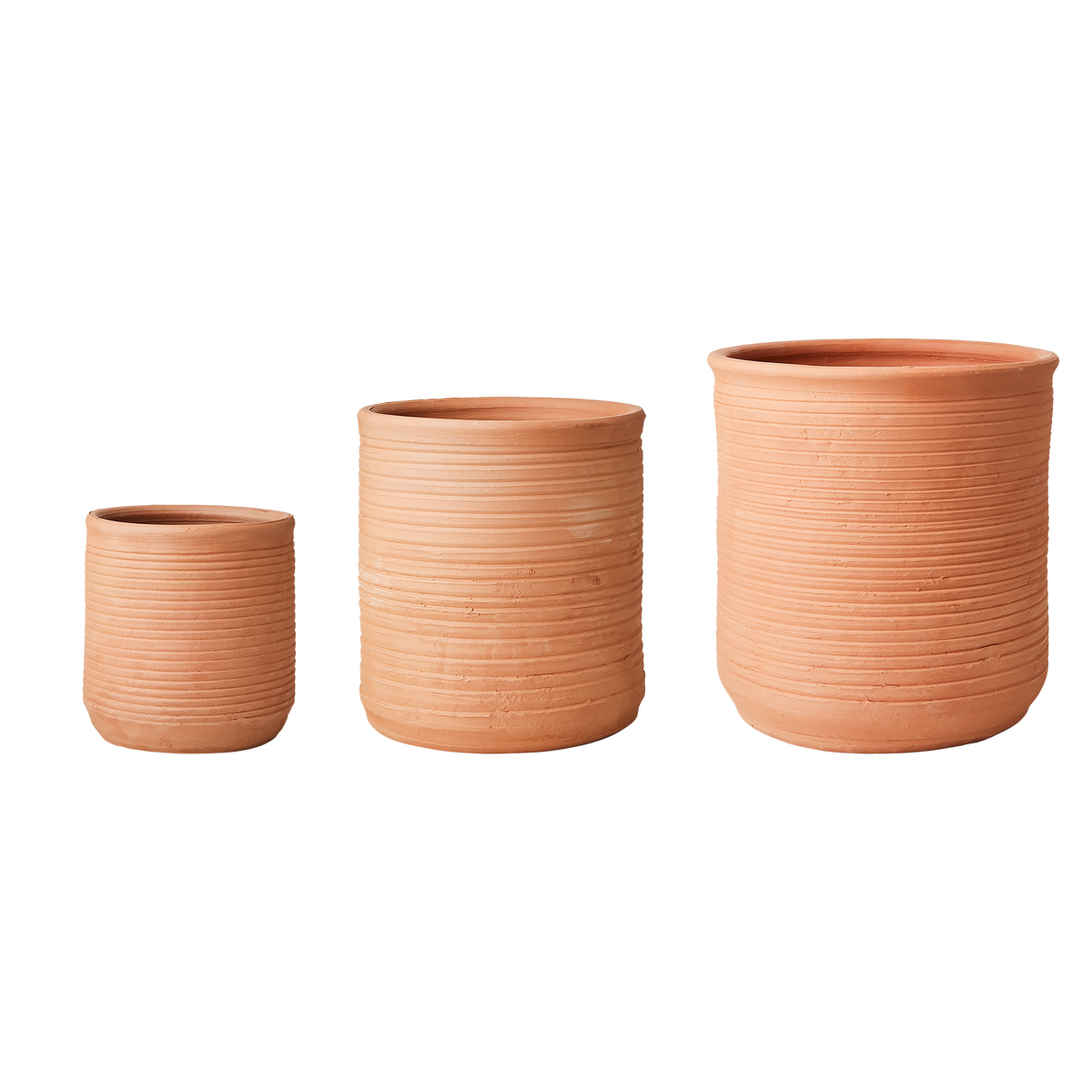 Hand-carved ridging and simple forms come together in the Ridge Terracotta Pot.