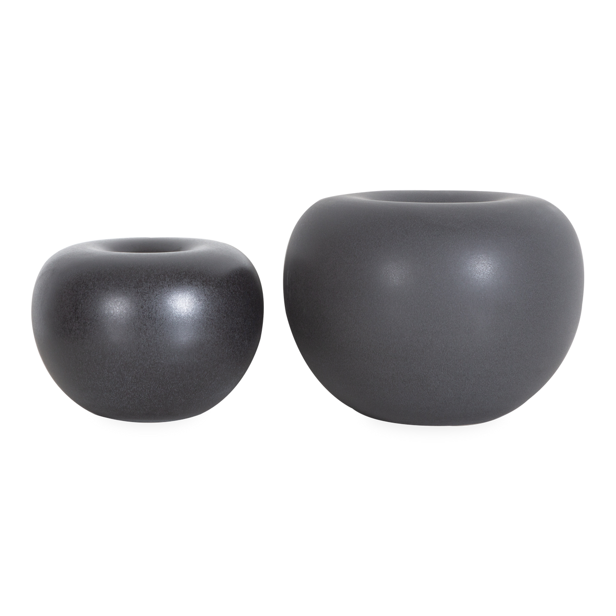 Focusing on nature and longevity, the Stoneware Round Vase is the reflection of amicable design and is defined by its cornerless, spherical body.