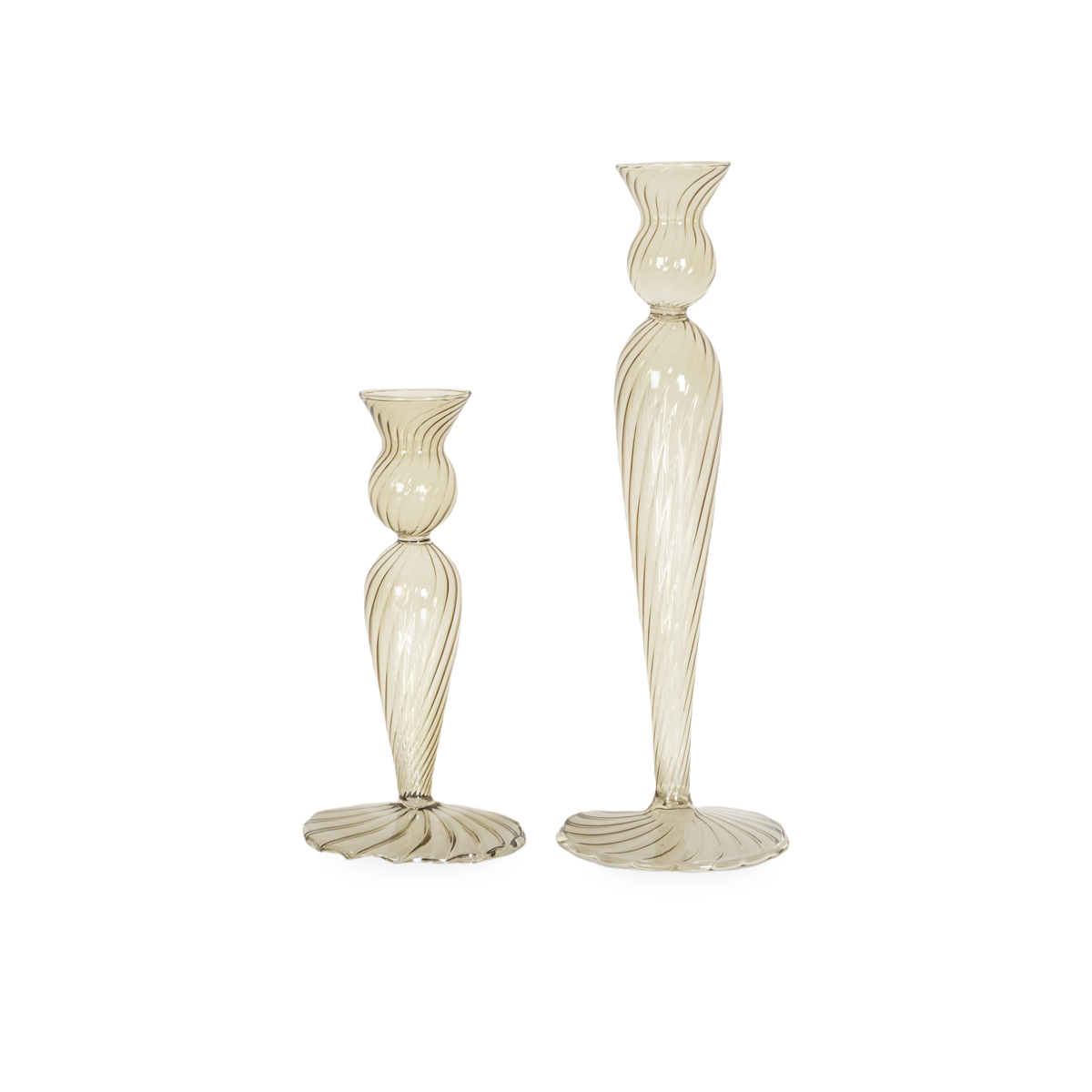 Bringing a touch of sophisticated design, the Swirl Glass Candle Holder features a visually pirouetting, tall silhouette and gentle curves.