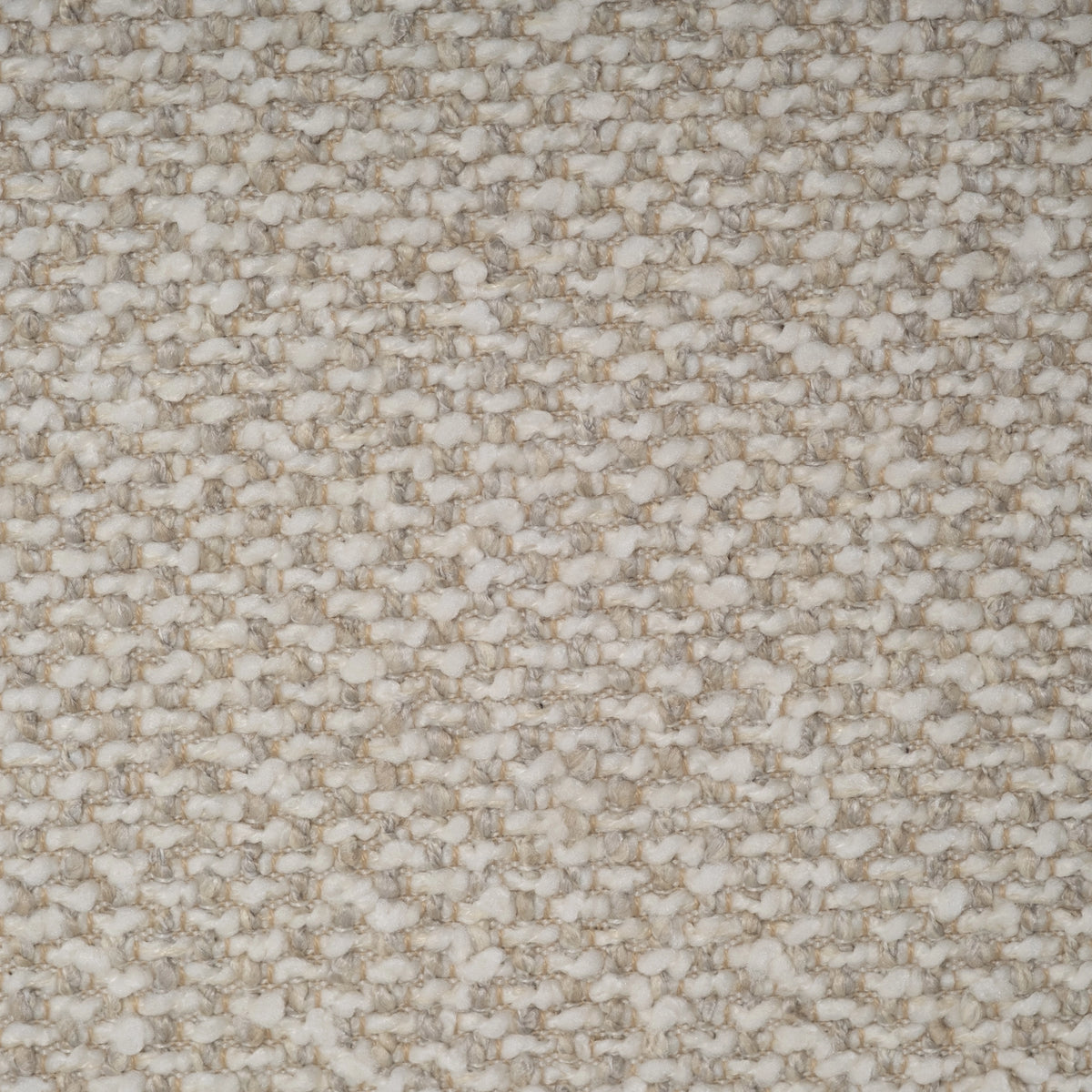 Close-up swatch of Oatmeal woven fabric on the Arlo Modular Sectional, showing creamy off-white nubs over pale taupe and sand threads.
