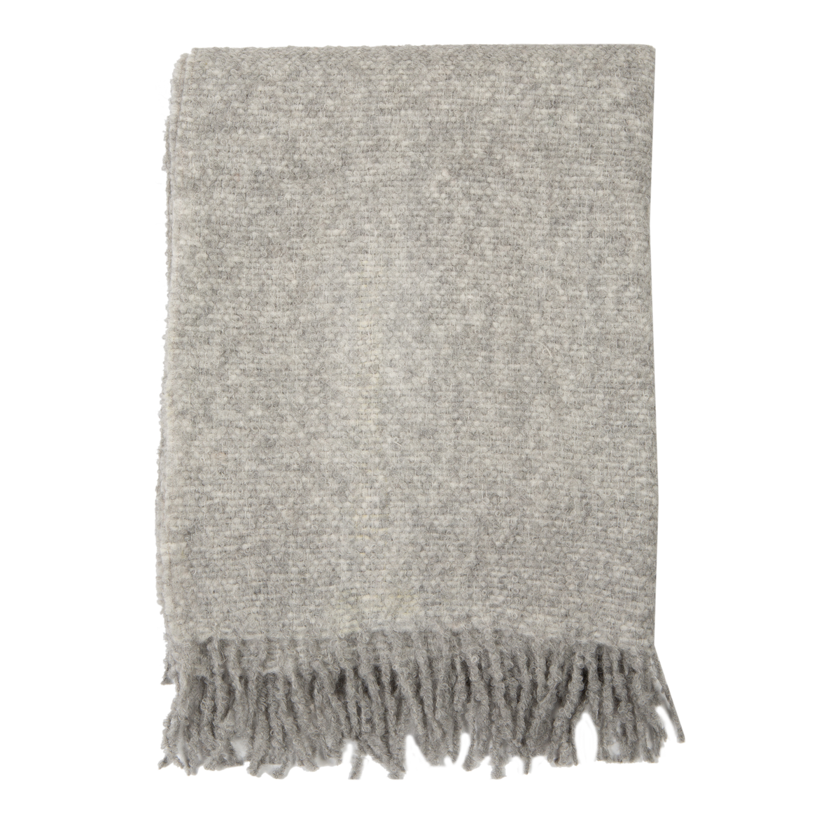 This textured Alpaca Boucle Throw is specially woven by artisans in Peru.