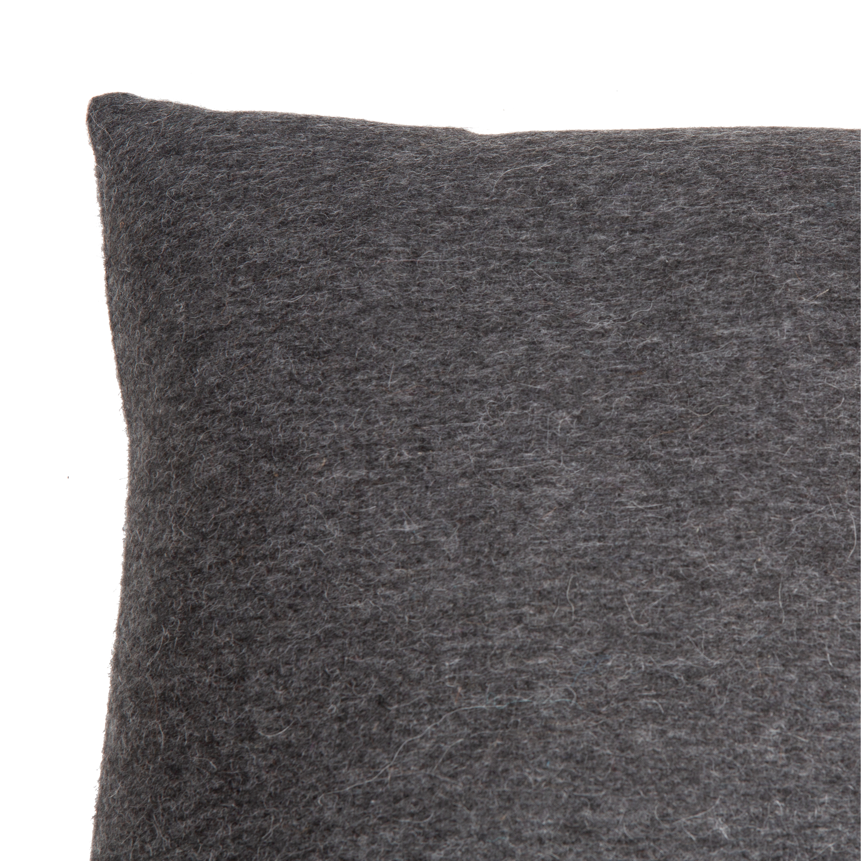 The Alpaca Lambswool Pillow is a classic design made from alpaca and lambswool fibres featuring a delicate texture in a charcoal grey color.