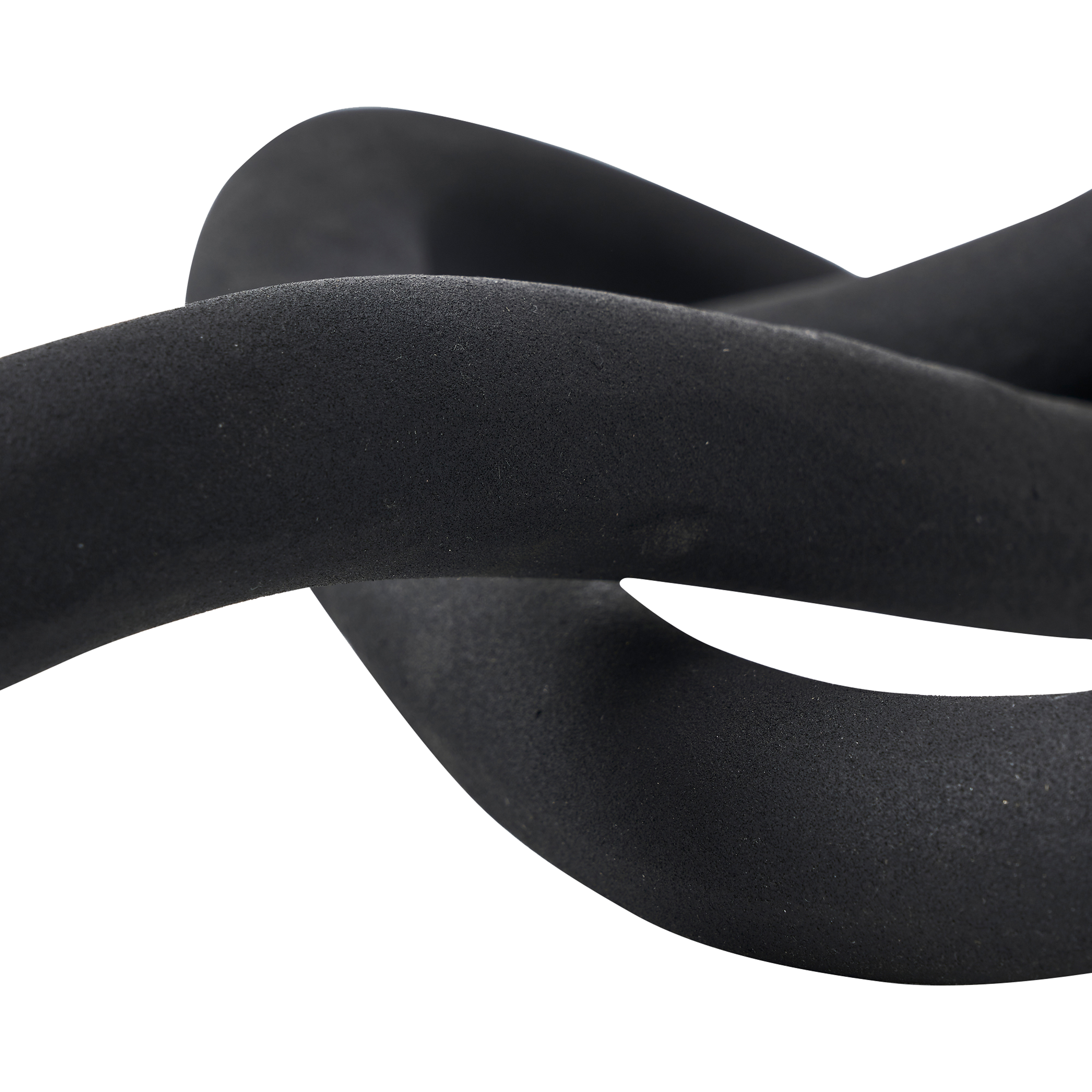 A romantic energy pours into the modern living space through this infinity knot décor accessory.