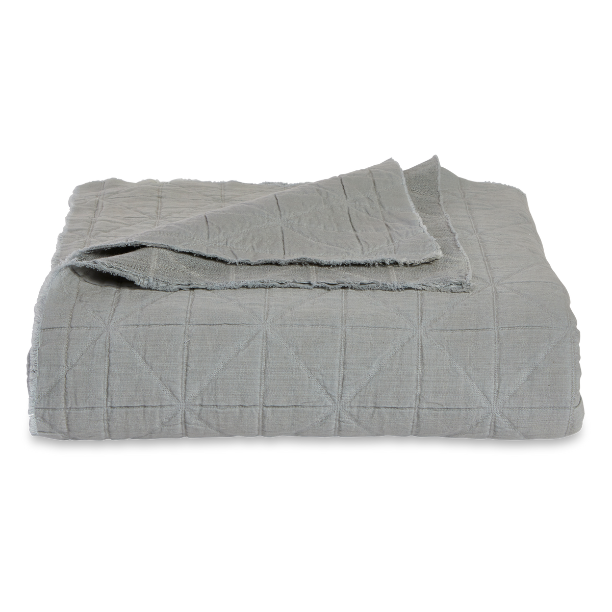 Relaxed and casual, this quilted coverlet is made with cotton and has the perfect summer weight.