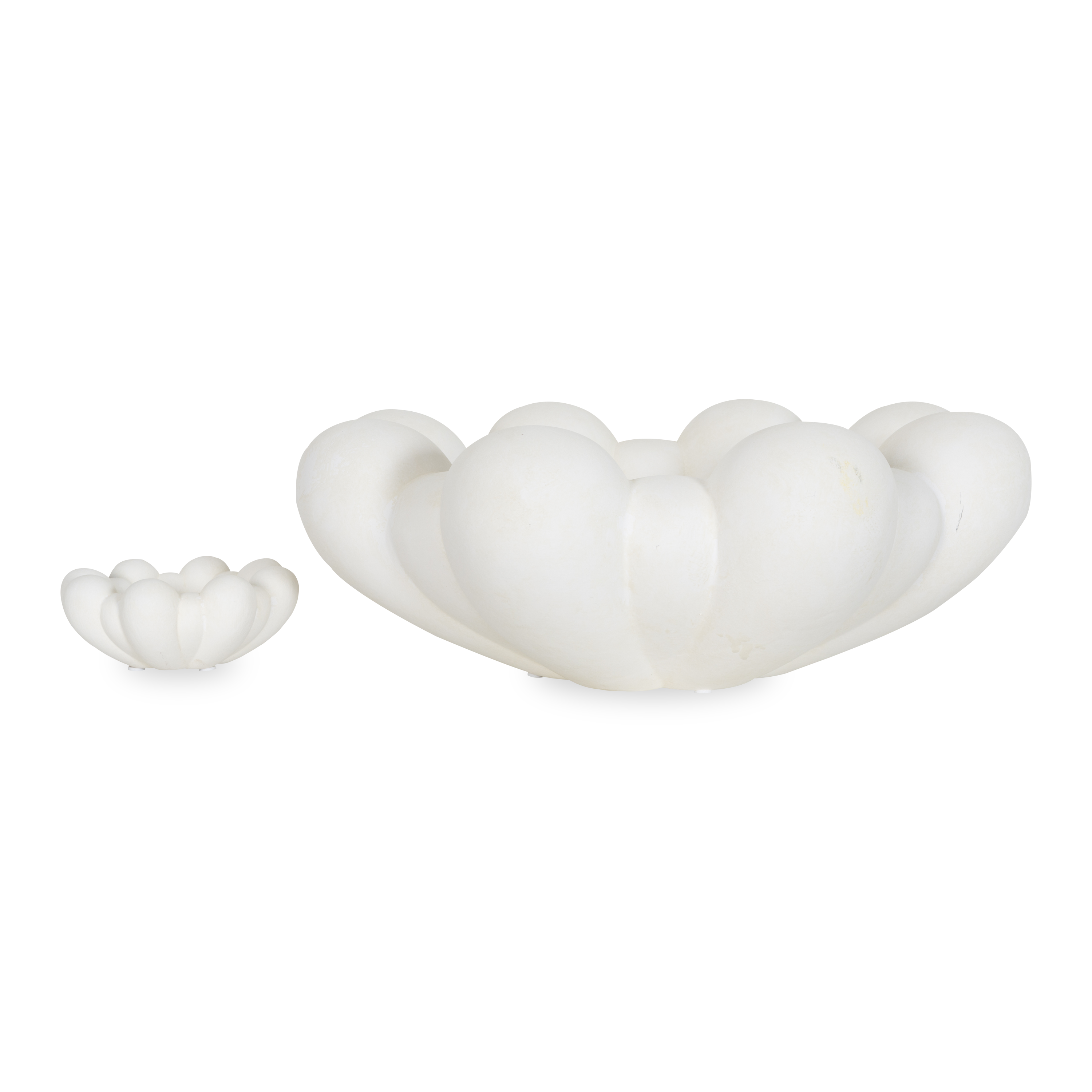 Inspired by floral shapes, The Bloom Tray emphasizes soft, organic shapes and features a hand-glazed ceramic body.