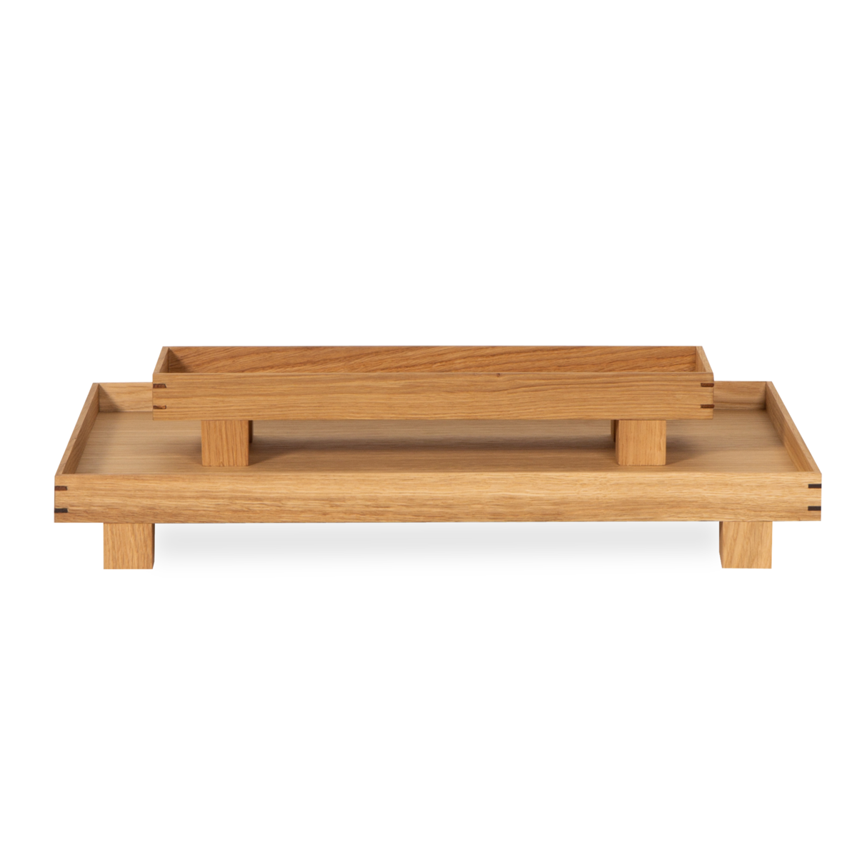 Drawing a clear line to Japanese aesthetic, the Bon series of wooden trays has a simple expression with a lightness from the four feet, lifting up the tray.